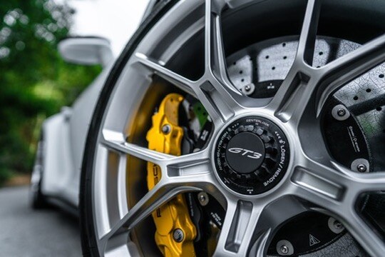 Porsche GT3 wheel and yellow brake caliper detail
